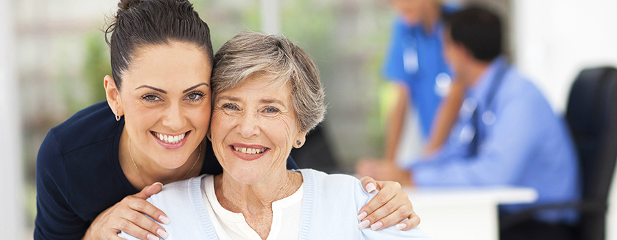Two women smiling