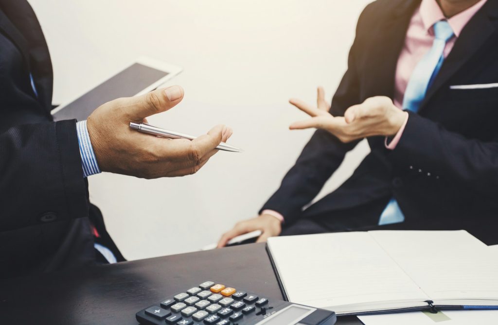 two people talking about insurance